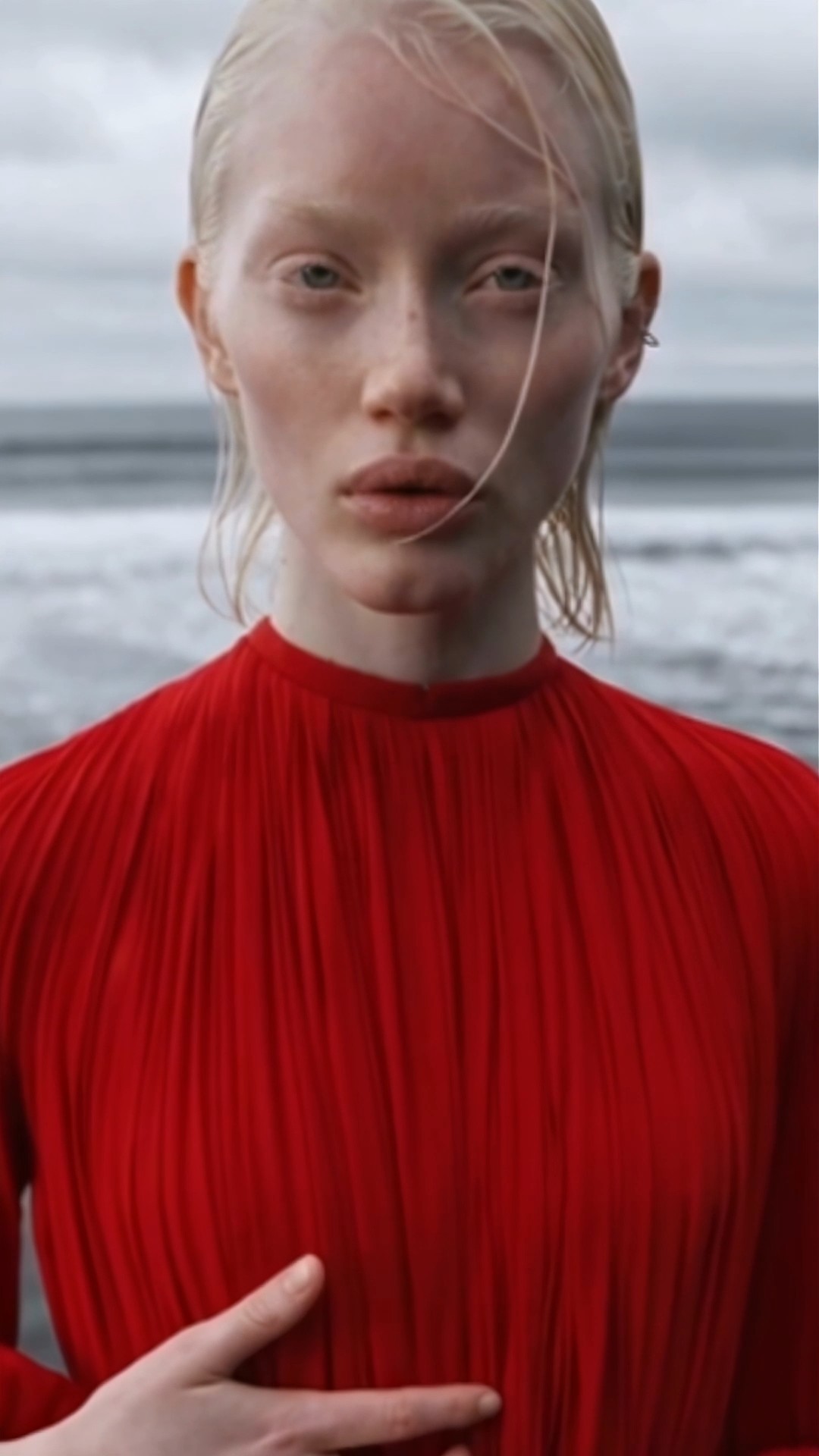 Portrait still from the fashion film